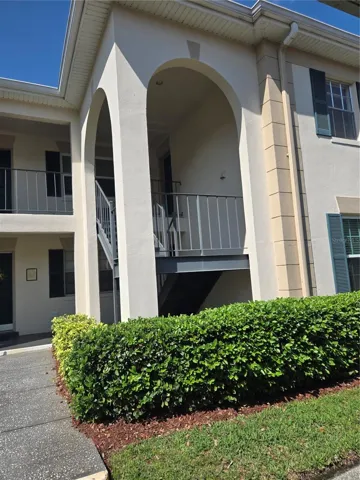 front of bldg entry to unit