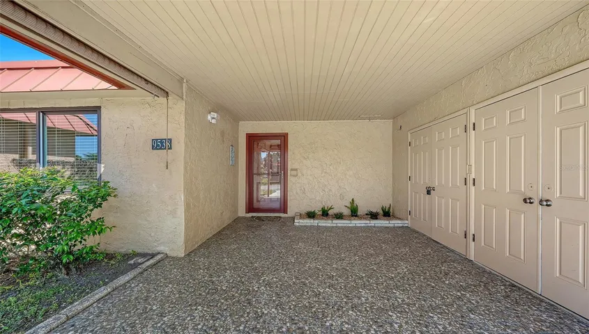 Paved, covered parking with storage