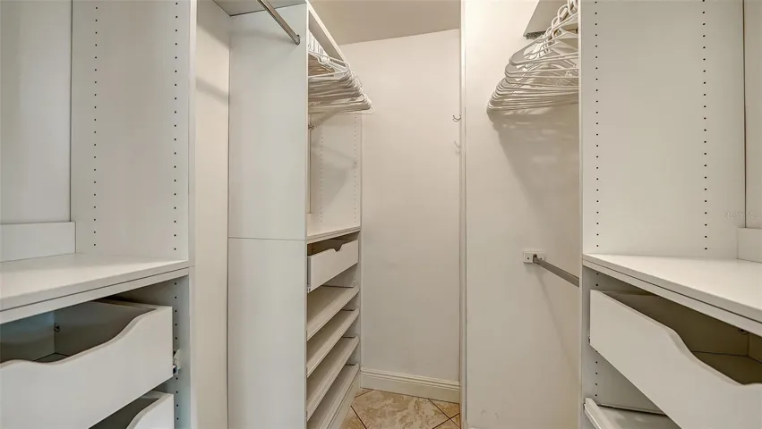 Built-in shelving in primary closet