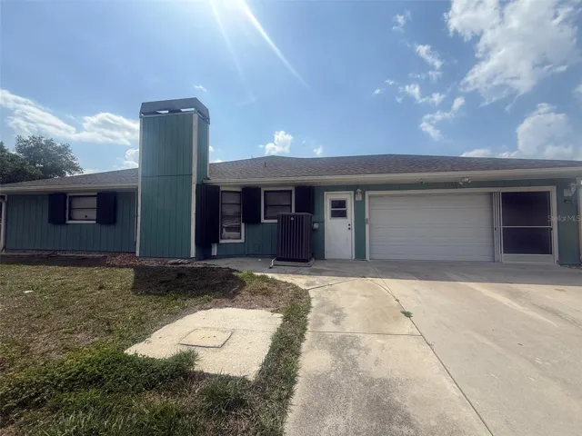 Side view, driveway, garage