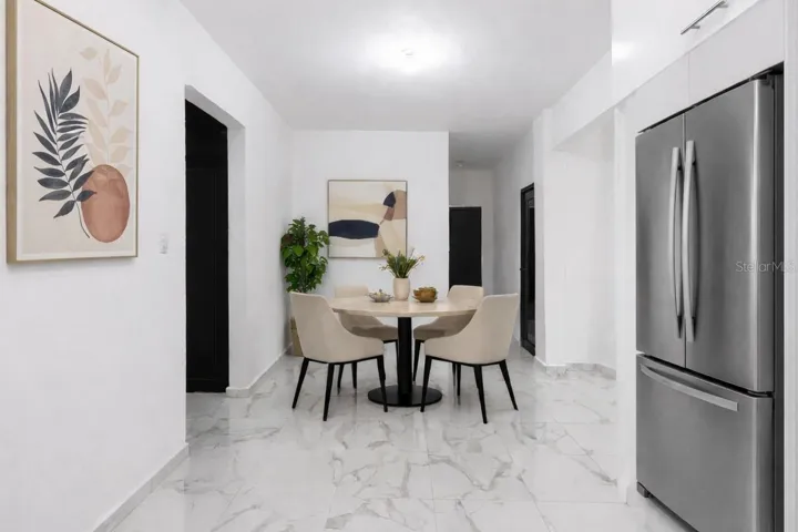 Furniture and appliances shown for illustrative purposes only.