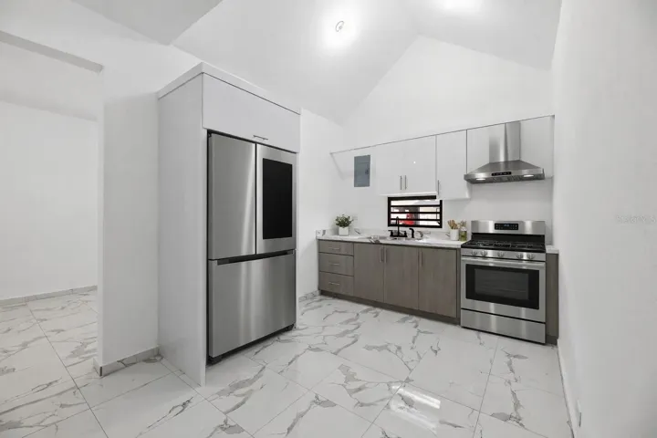 Furniture and appliances shown for illustrative purposes only.