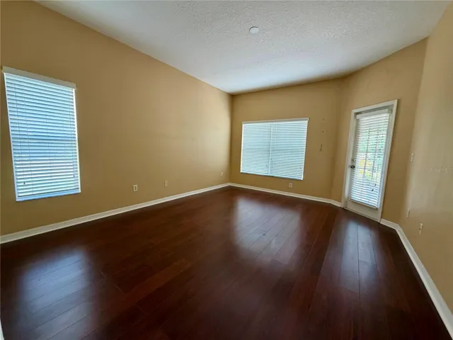 primary bedroom, door to backyard