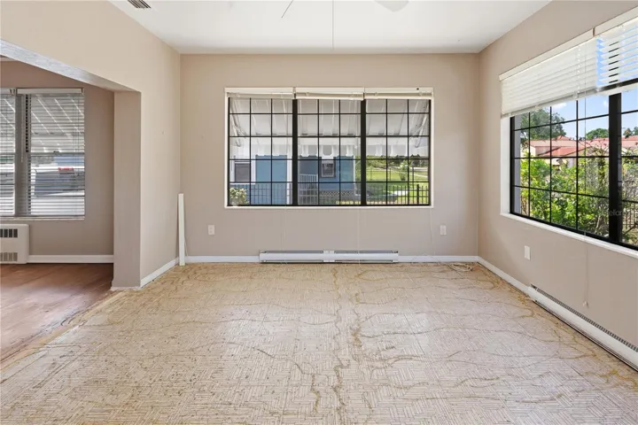 family room, carpet removed & ready for new flooring!