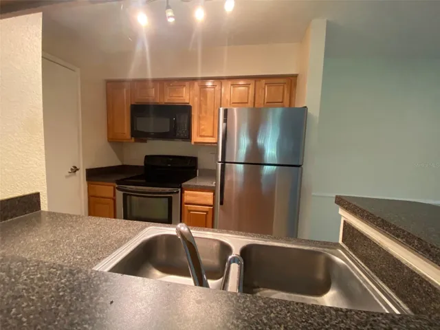 Kitchen with Washer Dryer closet and pantry,