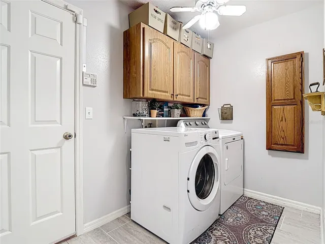 Laundry room next to garage.