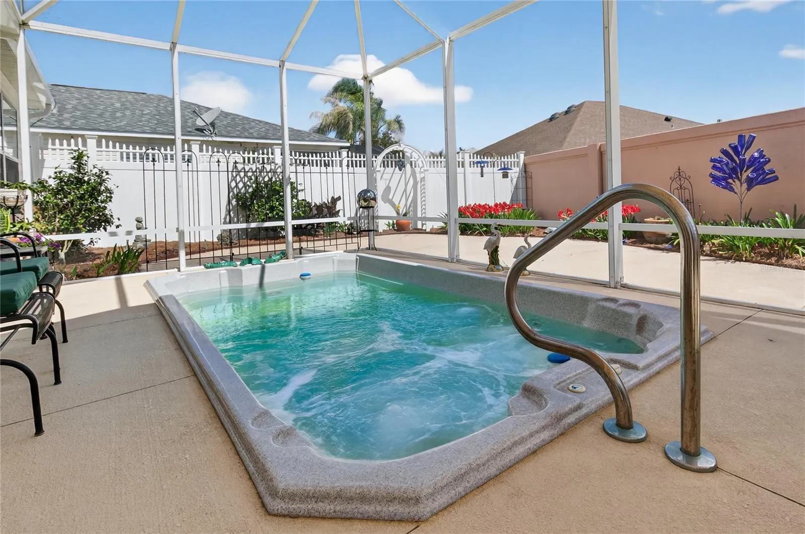 RELAXING JETTED SPA with comfortable seating, perfect for unwinding after a long day.