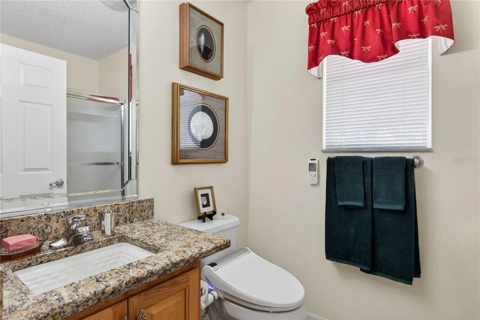 SECOND BATHROOM FEATURES GRANITE CPONTERTOP, BIDET AND TUB &amp; SHOWER COMBO