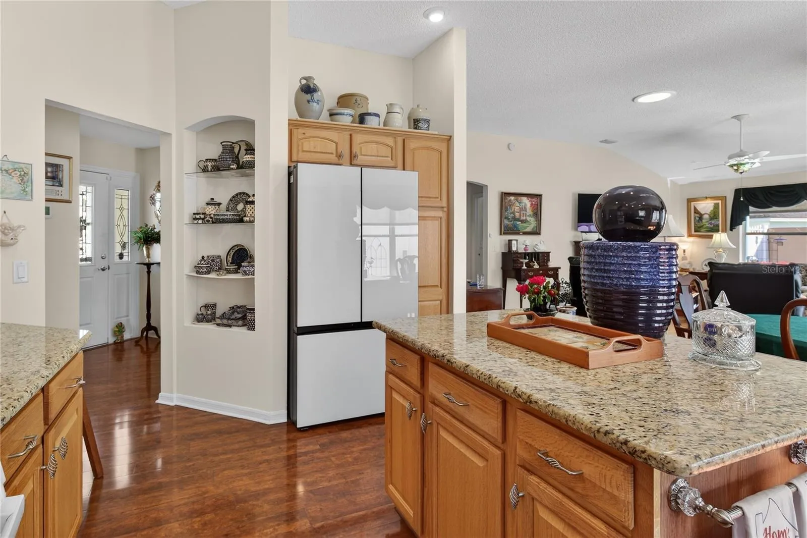 Detailed kitchen island featuring a generous amount of storage space, designed to efficiently organize and maximize the functionality of the kitchen area.