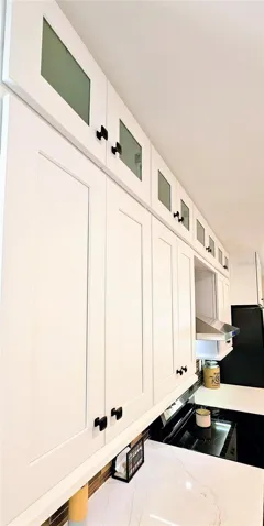 Upper Glass Cabinets with Mood Lighting