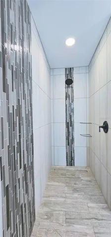 Her Entry Walk In Shower in Guest Bathroom
