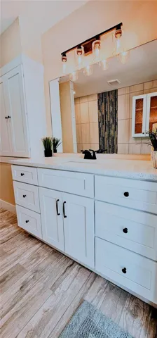 Quartz Countertop & Linen Cabinet Storage