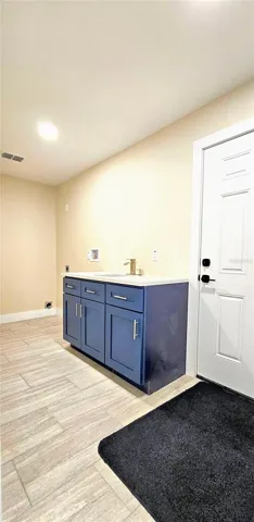 Laundry Room with Sink & Countertop