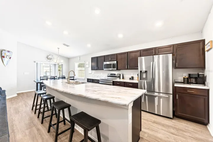 The Kitchen island is designed to accommodate counter-height stools.