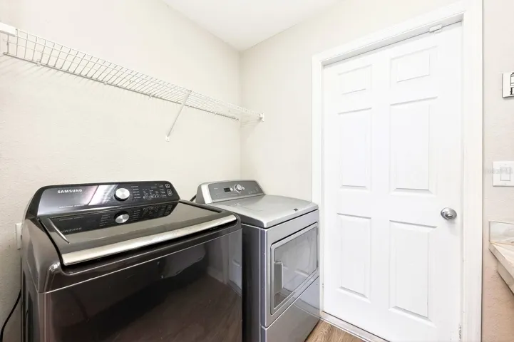 The Laundry Room is thoughtfully designed with a washer and dryer included, along with a storage shelf and COUNTERTOP SPACE—perfect for folding or even a small workspace.