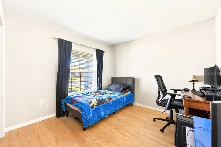 Bedroom 2 is perfectly sized for use as a guest bedroom, home office or hobby space.