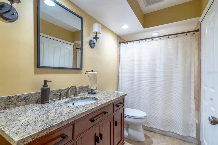 Guest Bathroom with Granite Counter Vanity