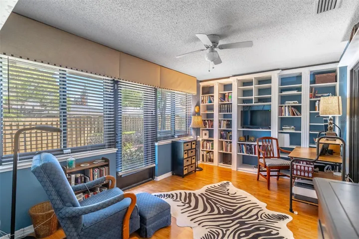Lovely Florida Room with French Door to Backyard