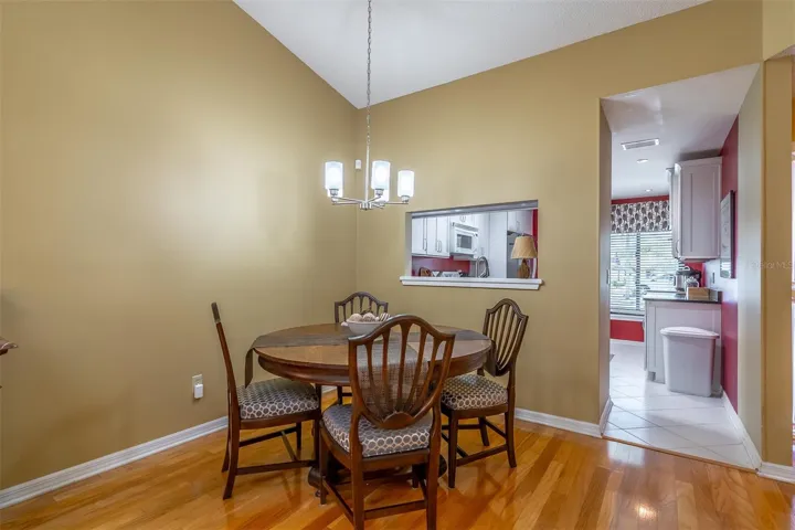 Dining Room with Pass Through Window to Kitchen