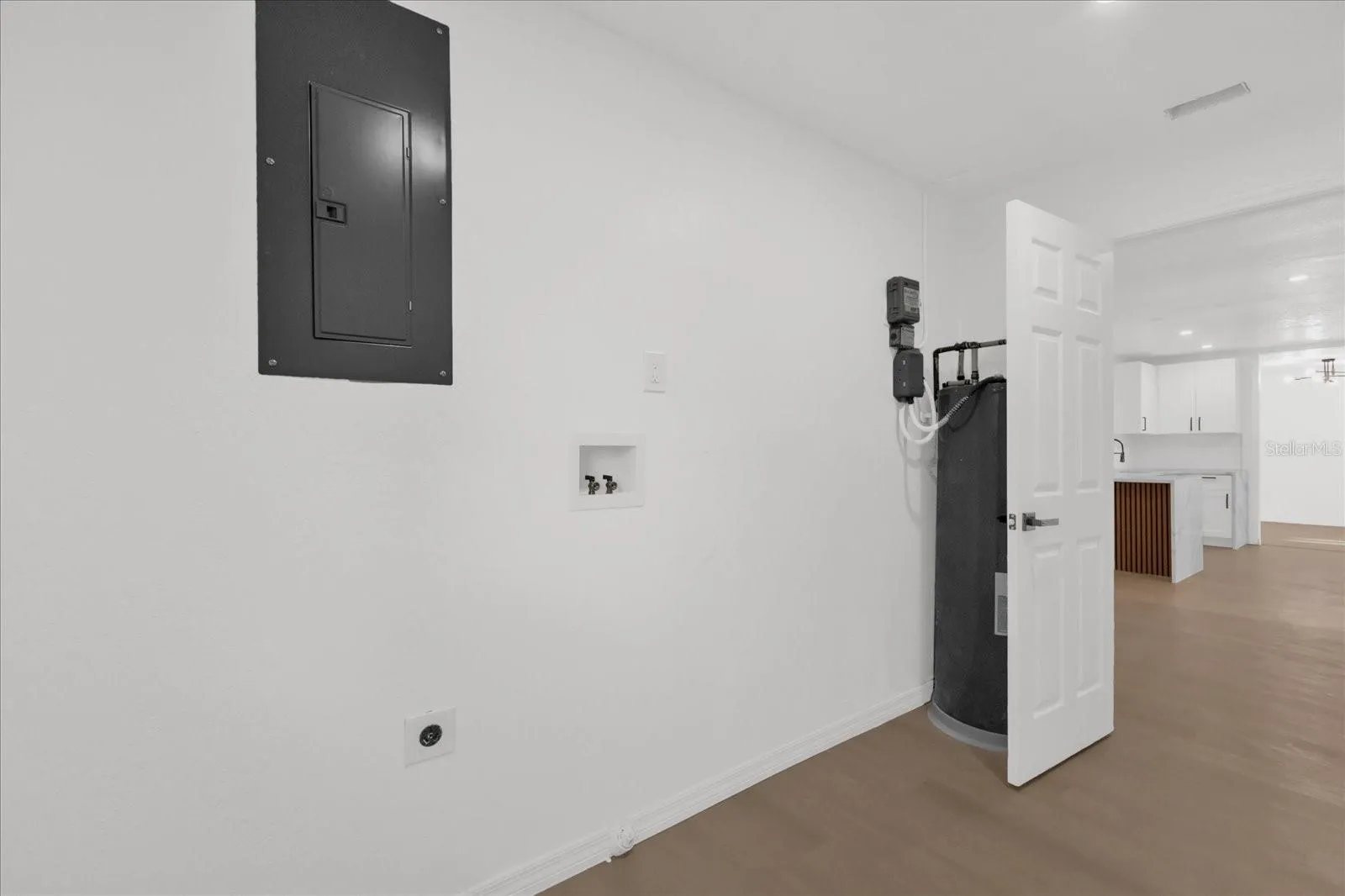 The Laundry room is approx 11x7 is off the family room and also acceses the garage. You ahve plenty of space for full scale washing appliances as well.