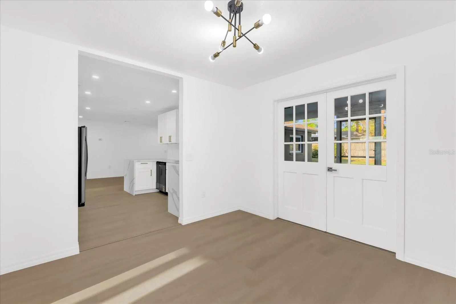 Dining room, 11x11 is located near Living Room and the Kitchen. It also features French Doors to the Patio.