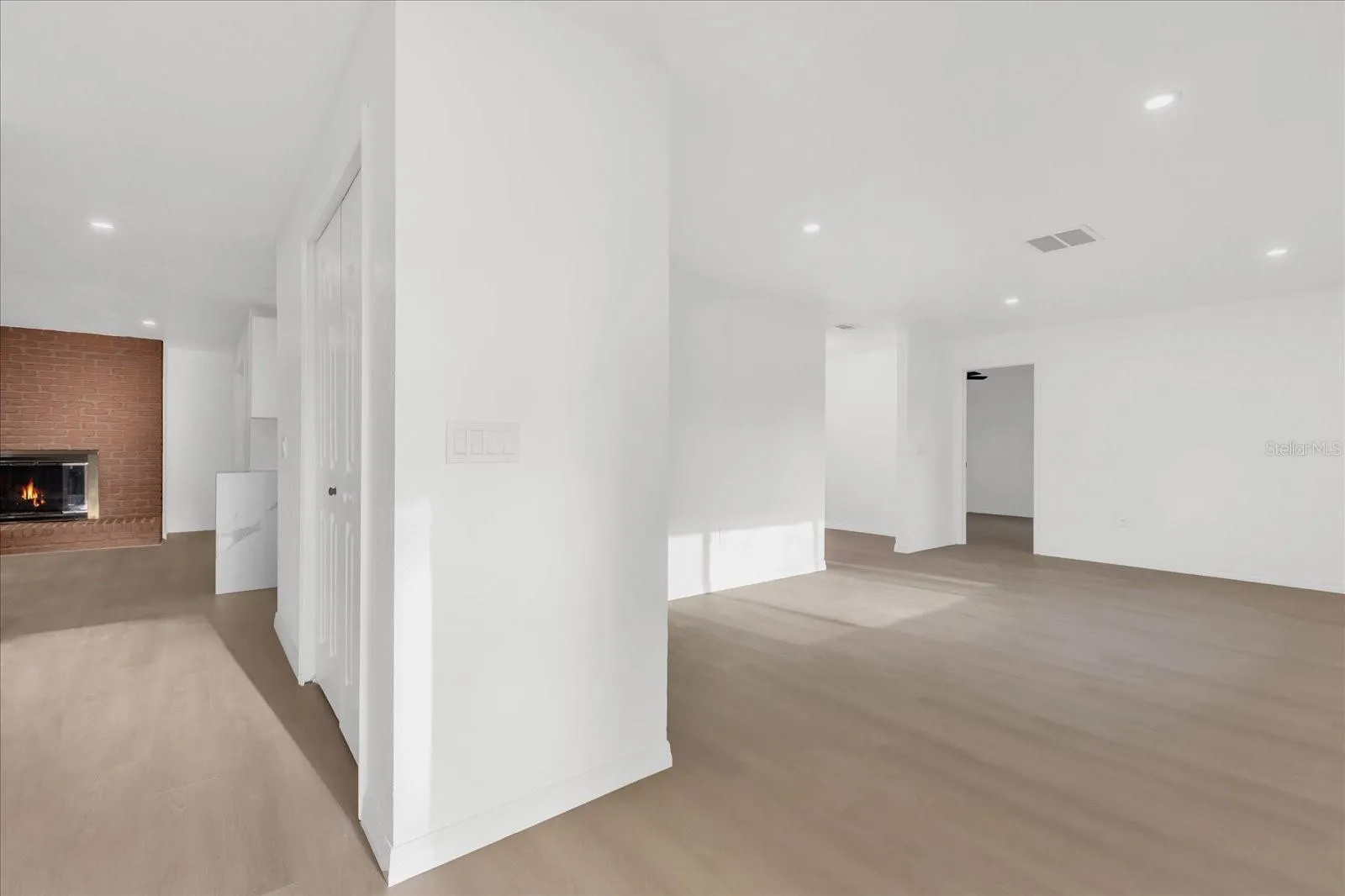 Foyer, showing coat closet on left into the Family Room, Living Room is to the right.