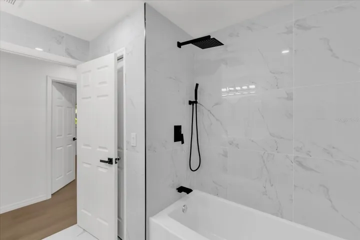 Secondary bathroom with pool access