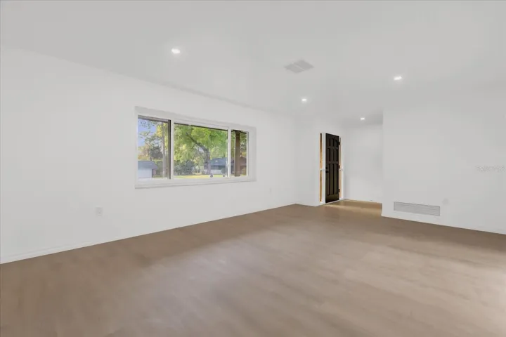 Living Room from a different angle, approx 19x13. Perfect for large gatherings, near Dining, Kitchen and Family room for overflow.