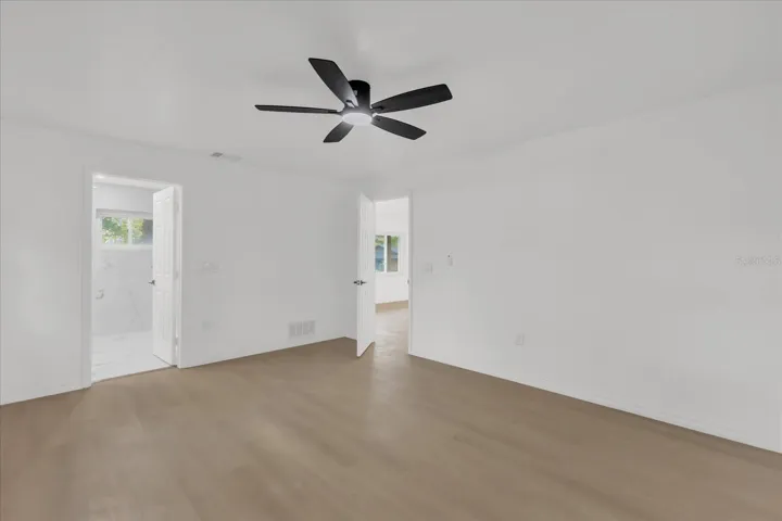 Primary Bedroom (approx 12x16) is very spacious and is on the opposite side of the home with great natural light, ensuite bath, walk in closet.