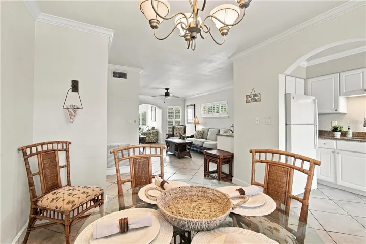 Dining area looking into living room