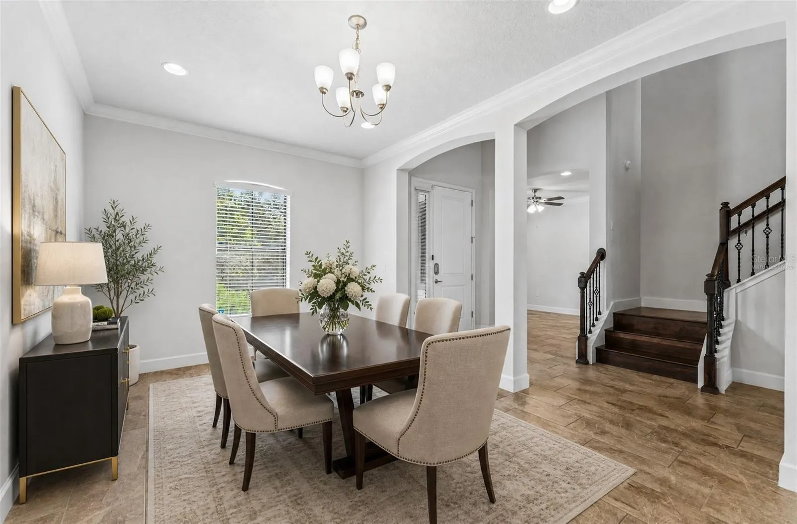 Host with ease in the formal dining space. Virtually Staged.