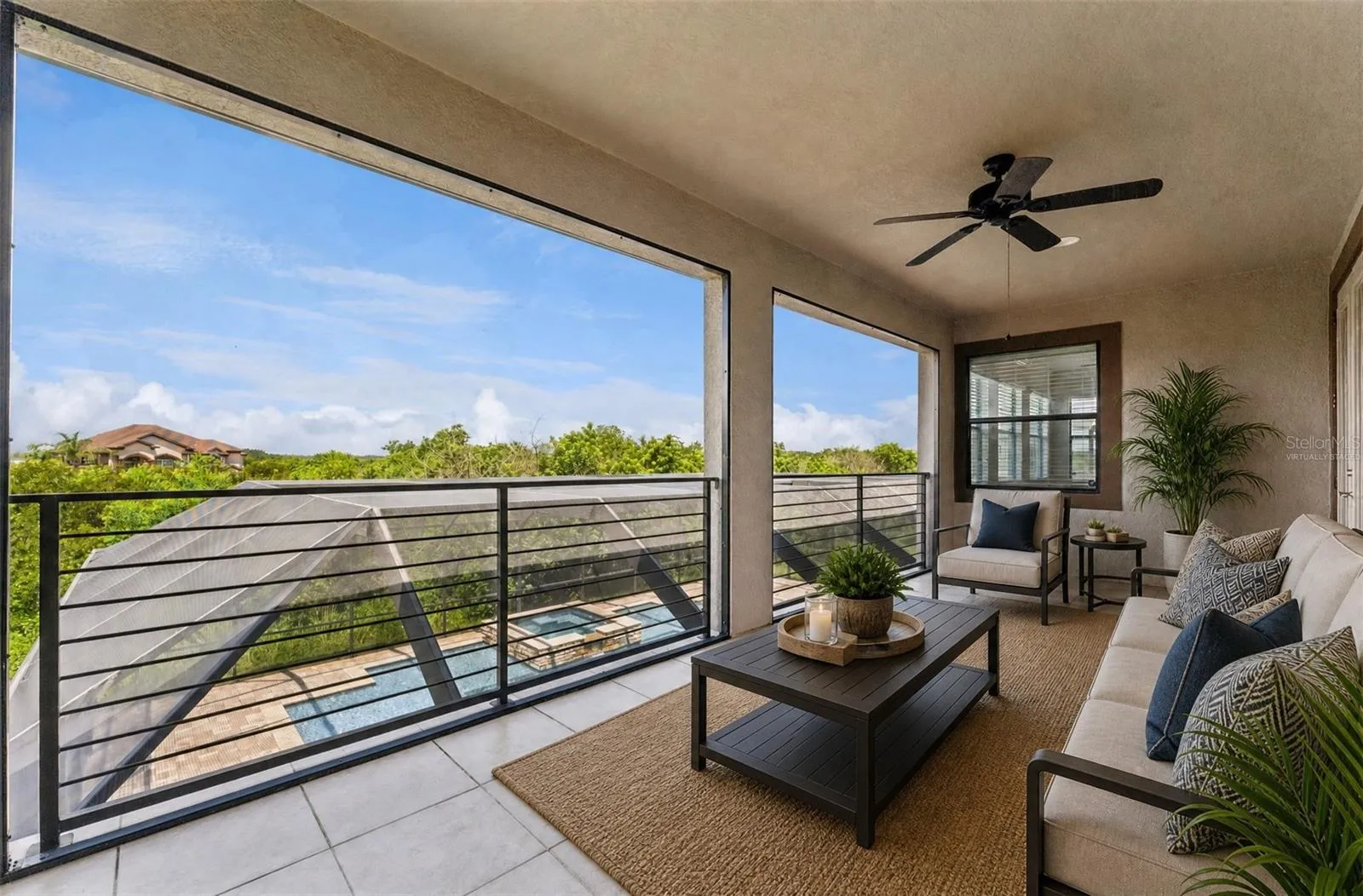Second floor balcony delivers conservation, lake and sunset views! Virtually Staged.