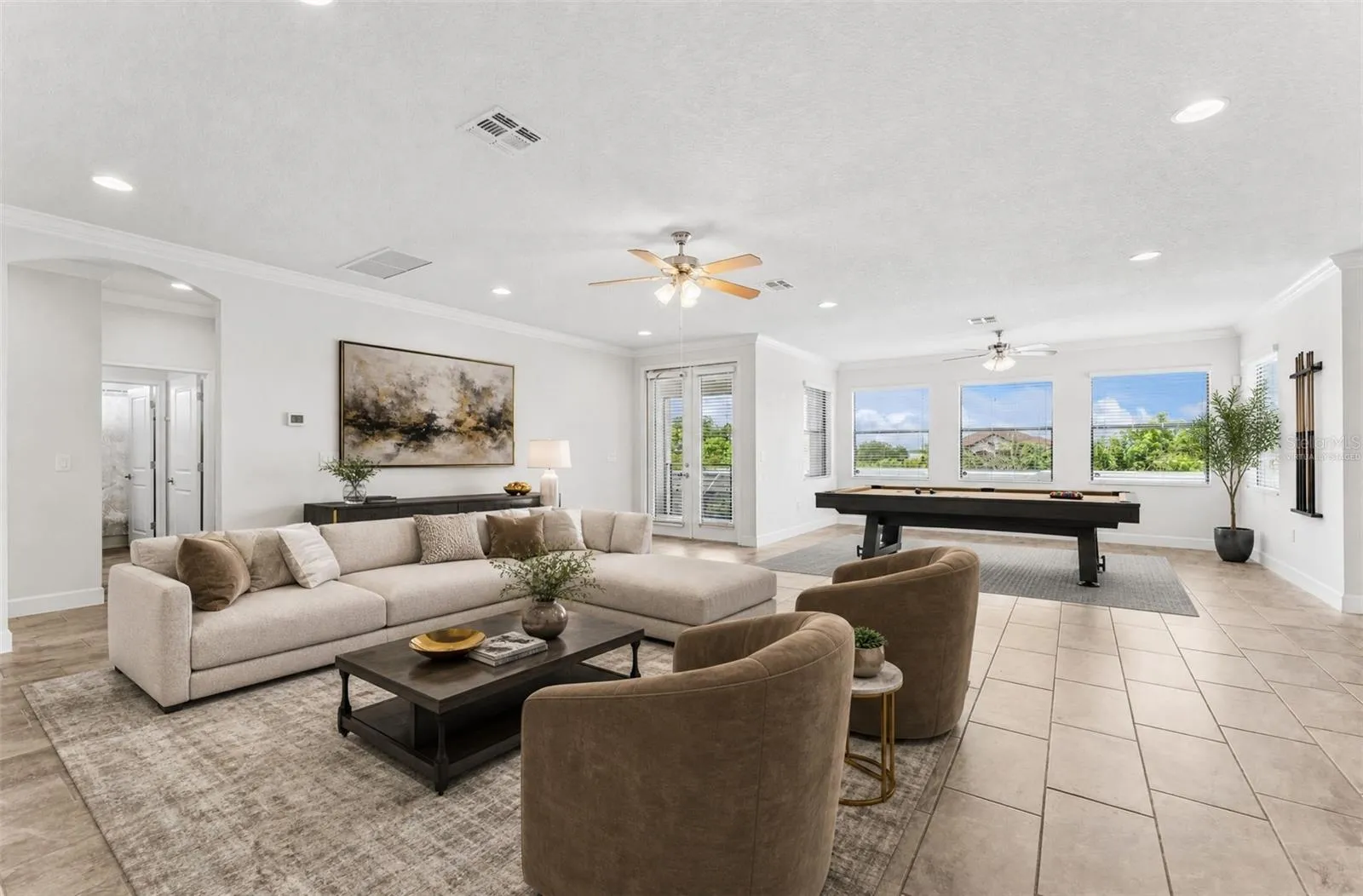 Huge light filled loft greets you at the top of the stairs. Virtually Staged.