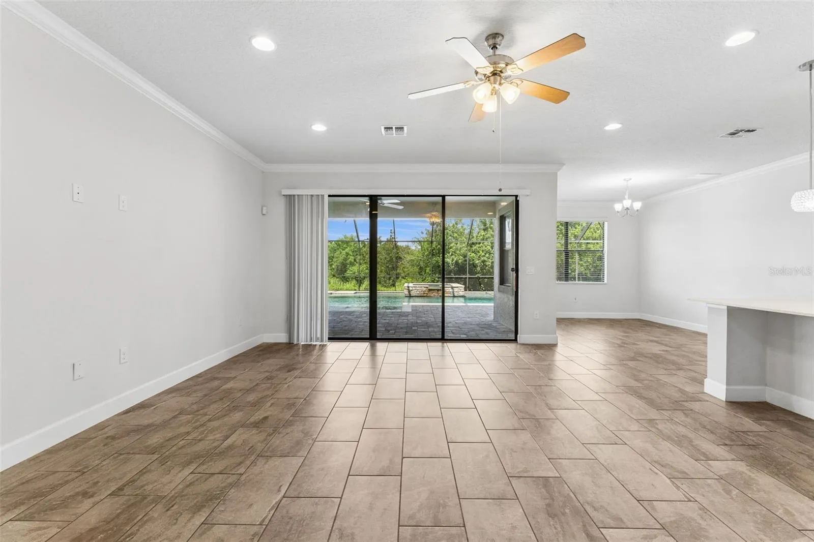 Light filled living, kitchen, casual dining.