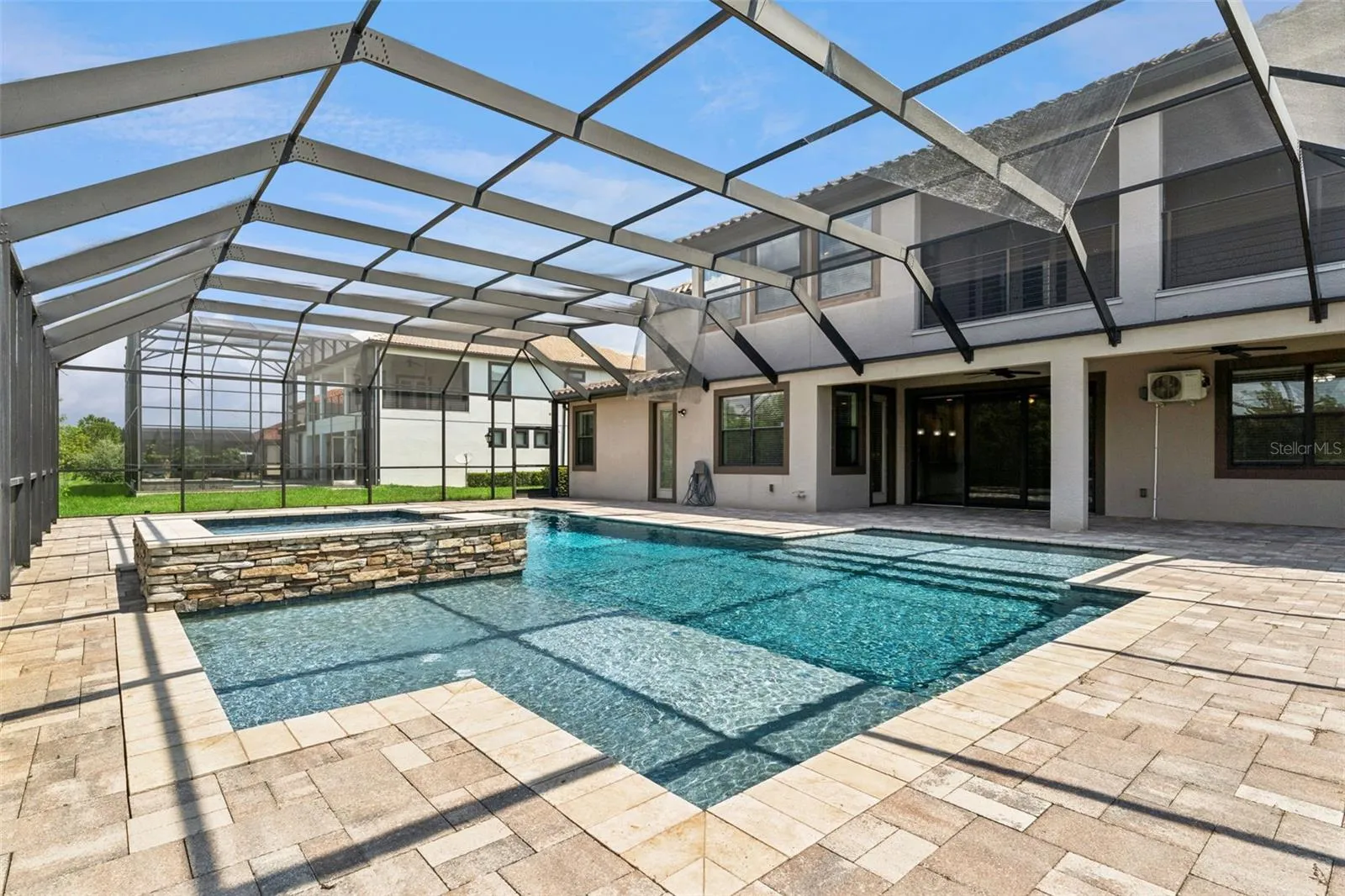 Custom pool and heated spa.