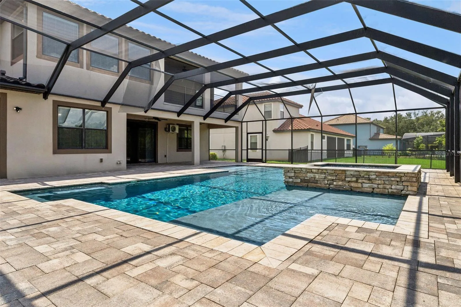 Custom pool and heated spa.