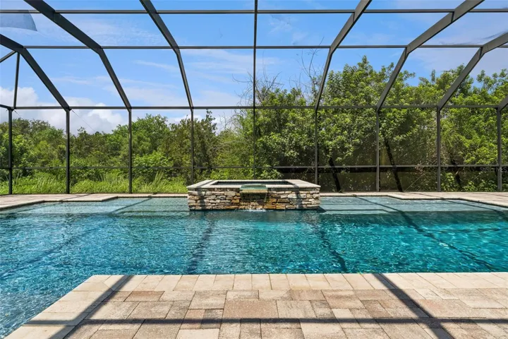 Wooded views from your private screened pool.