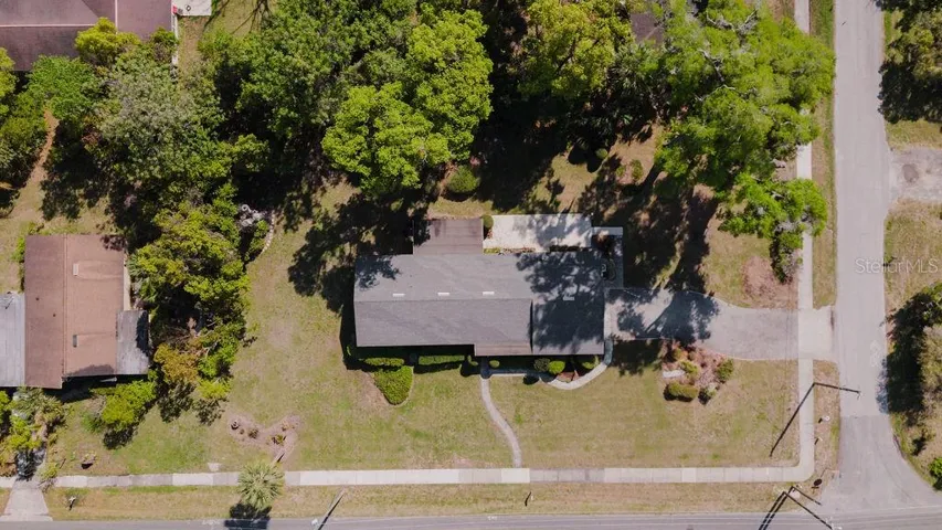 Aerial view of large corner lot.