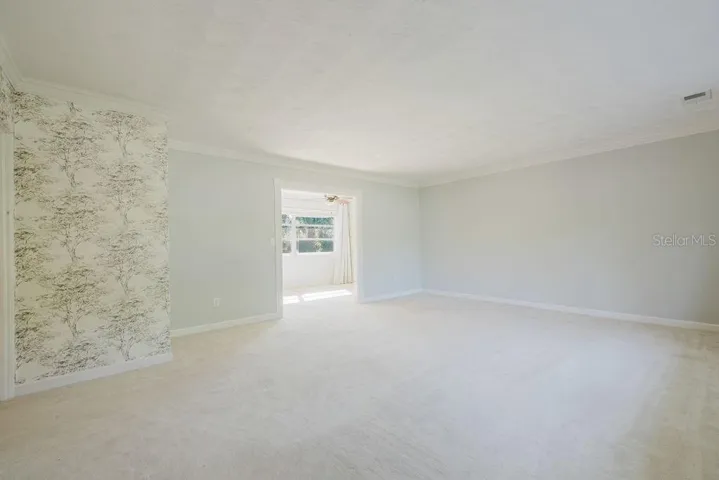 Living room from front door with view of breakfast nook.