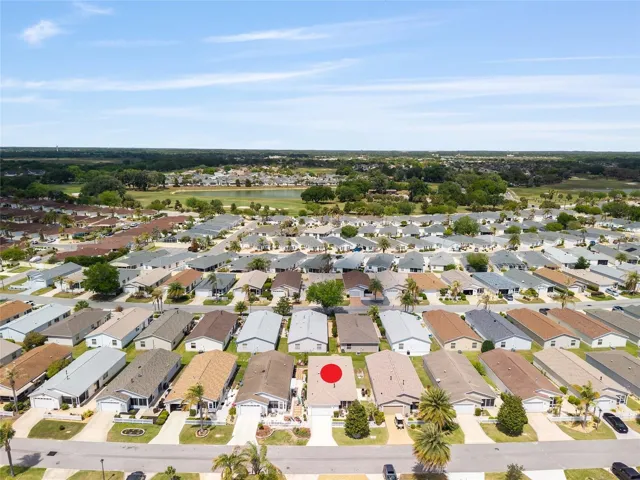 AERIAL looking North - illustrating the short distance to Lake Sumter Landing in the distance via Canal Street at right, with Mallory Hill Championship Golf Course - Virginia Nine also in view.