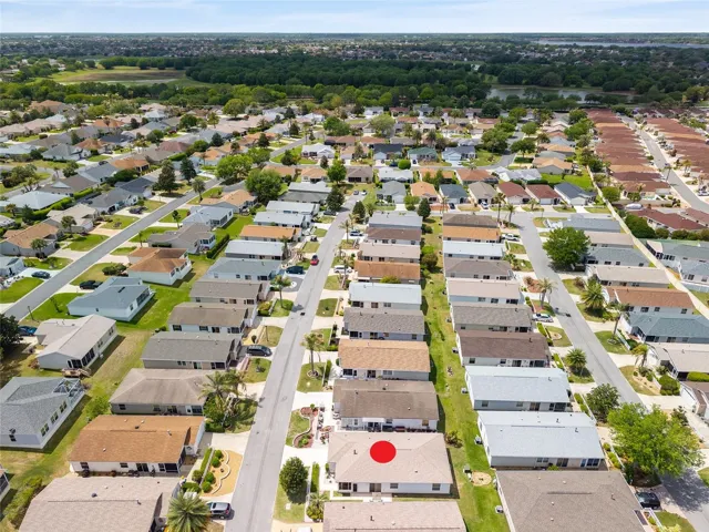 AERIAL looking West - featuring Eagle Preserve at center, with Cane Garden Championship Golf Course and beautiful Lake Miona beyond.