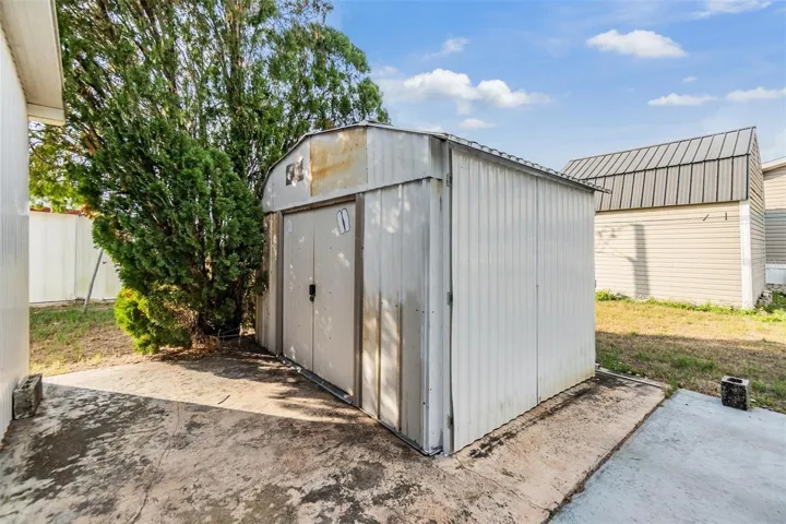 Golf cart storage shed.