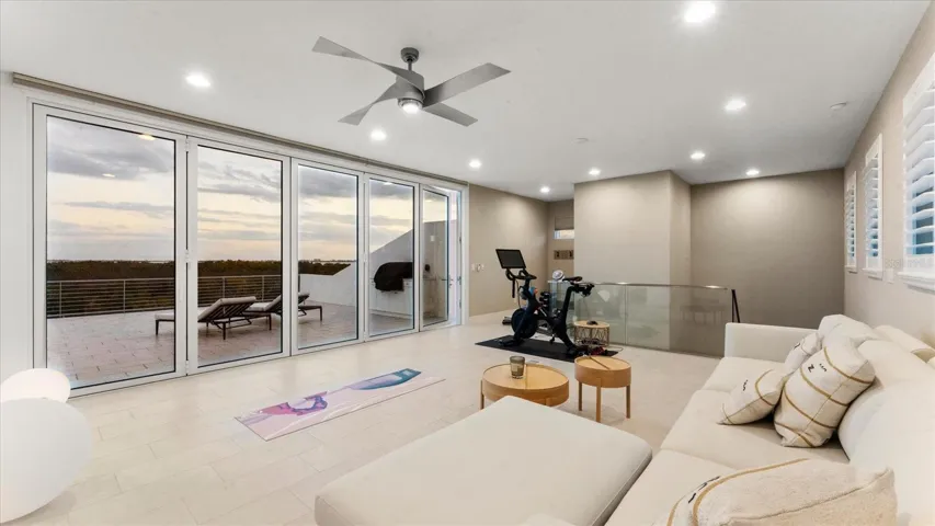 top floor bonus room, with kitchen, 1/2 bath, large balcony