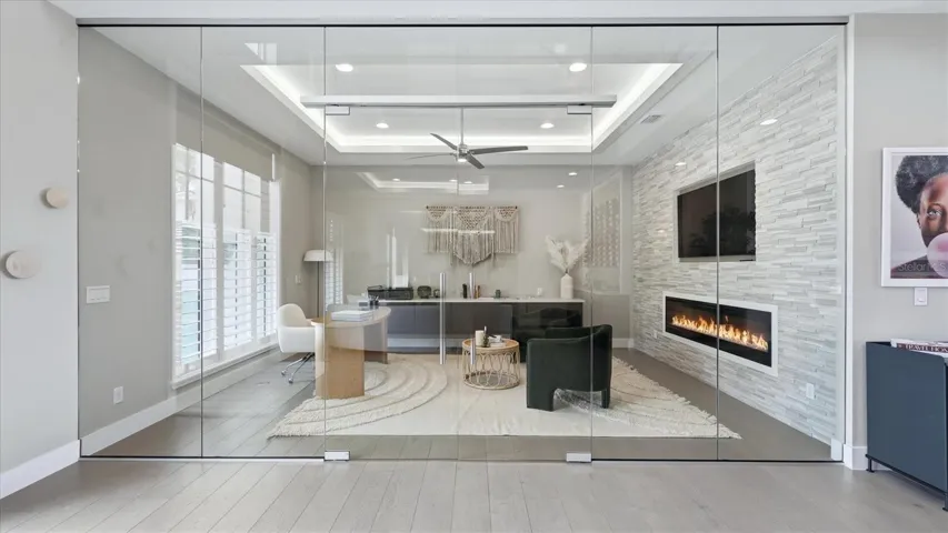 home office with glass wall