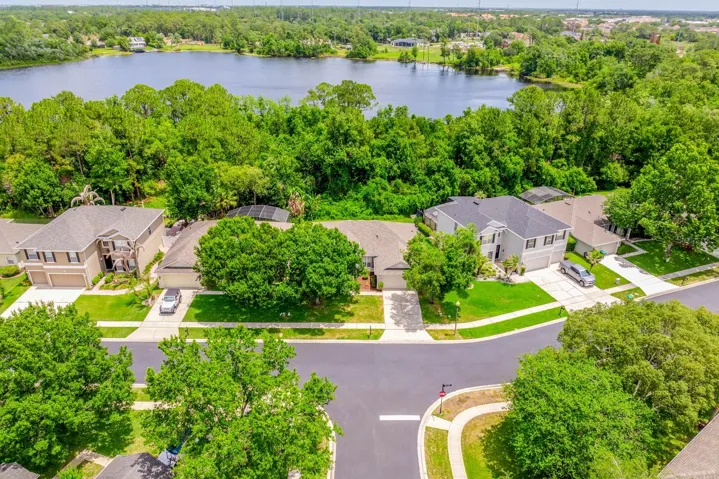 Mature trees and Lake Kehoe create a picturesque backdrop.