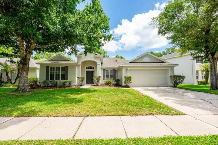 Set on a prime CONSERVATION LOT with Lake Kehoe as the picturesque backdrop, this East Orlando gem is surrounded by beautiful MATURE TREES and delivers the privacy, peaceful WOODED VIEWS, and MOVE-IN READY feel that can be hard to find in such a central location!