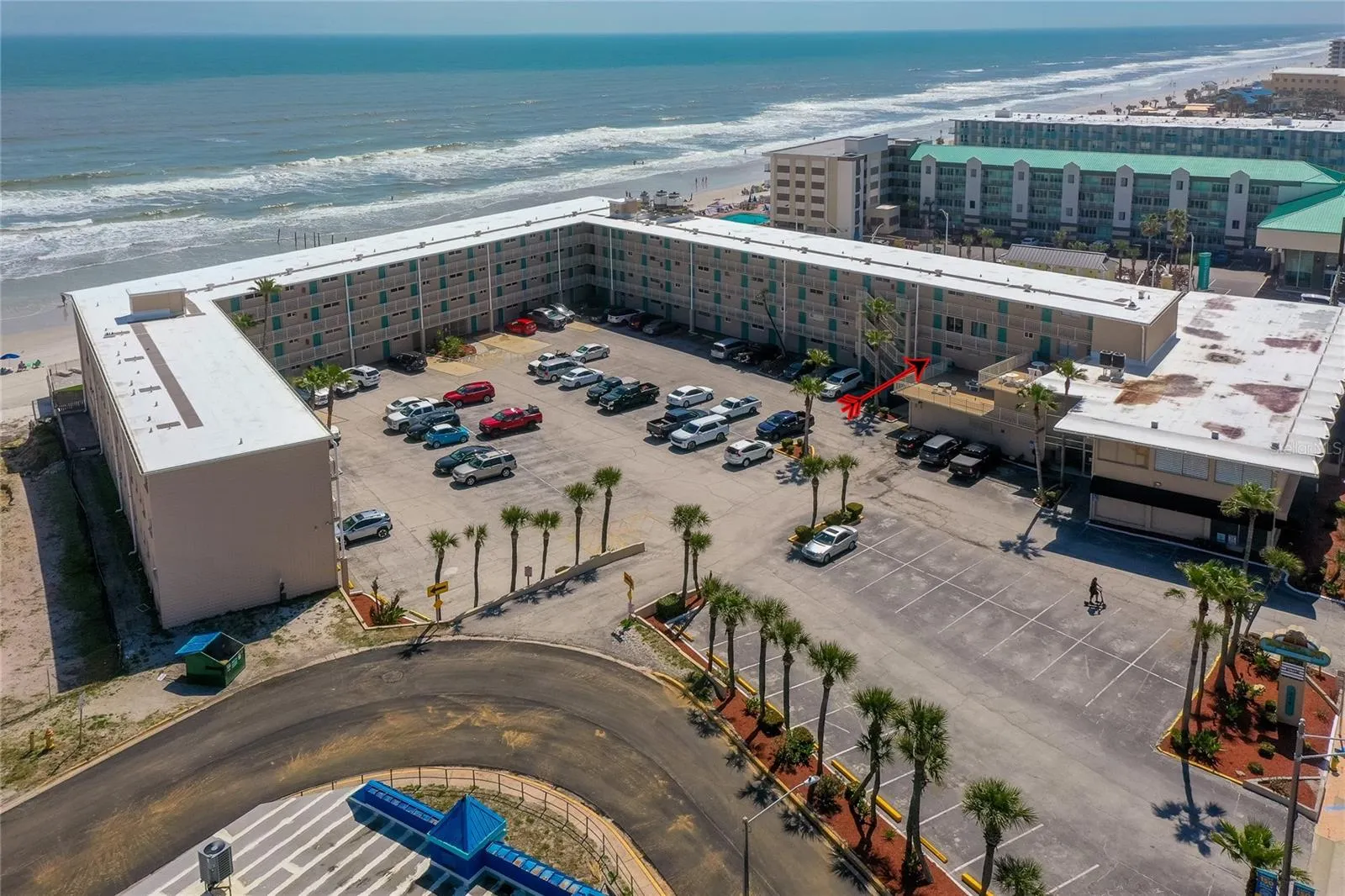 Aerial view highlights the building layout and helps show the unit’s position within this oceanfront complex.