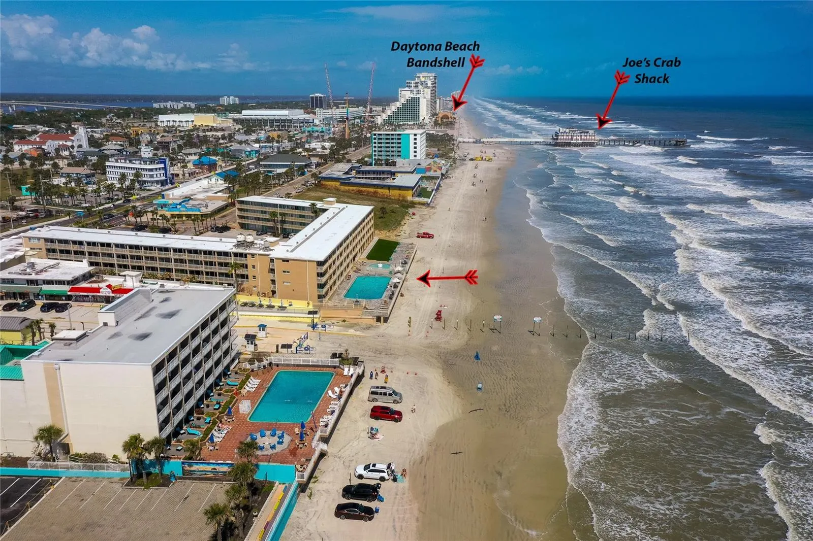 Aerial location view highlights the property’s proximity to popular oceanfront attractions, dining, and entertainment destinations.