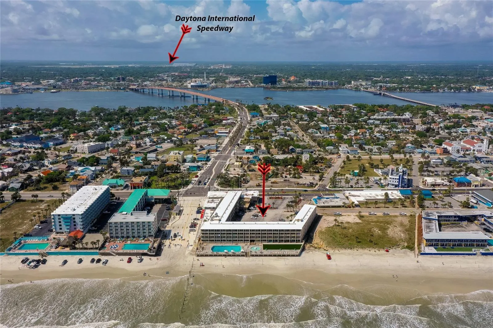Wide aerial view captures the property’s oceanfront setting with convenient access to the beach and a strong connection to the surrounding Daytona Beach area.
