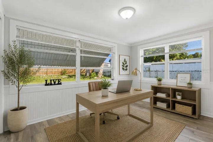 Virtually staged as a home office.
